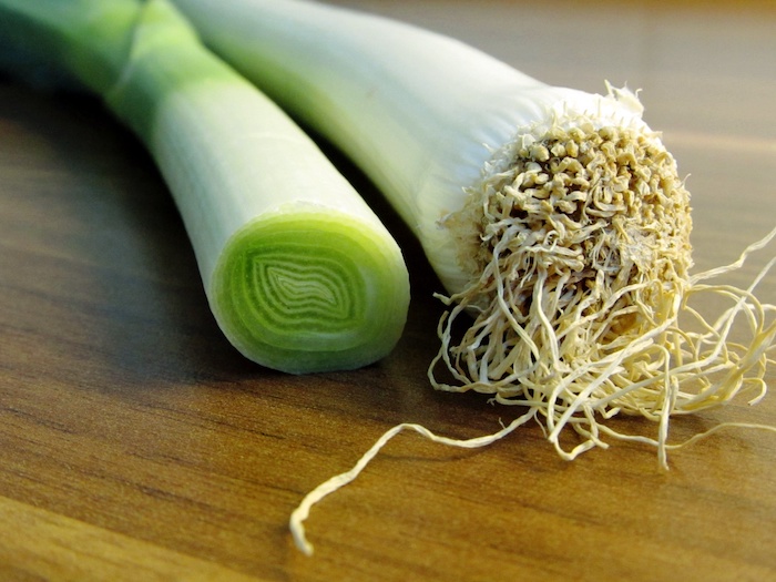 Uprooted leeks on table